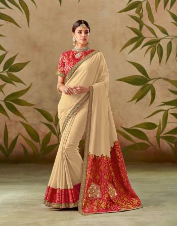 There's a beautiful vibe that simple sarees exude. Embrace simplicity in this beige saree adorned with a touch of red and handwork details and look beautiful.