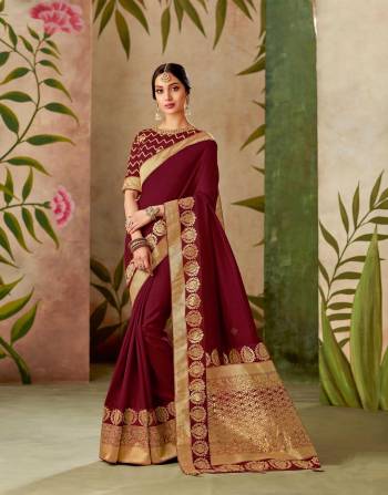 Adorn in a saree and emanate superiority like the maroon hue. Add meenakari jewels to uplift the queenly look. 