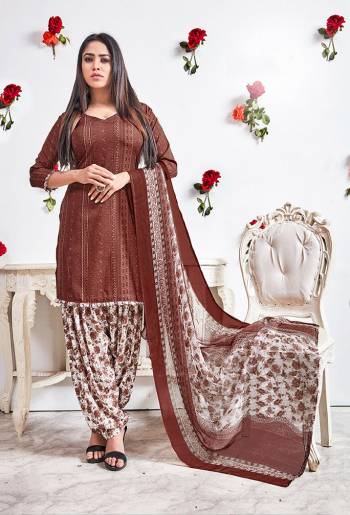 Beat This Heat This Summer With Some Casuals Like These Pretty Dress Materials. This Dress Material Is Fabricated On Crepe Paired With Chiffon Fabricated Dupatta. It Is Beautified With Prints All Over. Buy Now.