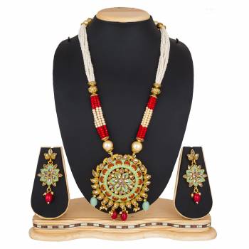 For A Queen Look, Here Is A Designer Royal Looking Necklace Set In Golden Color. This Necklace Set Can Be Paired With Heavy Ethnic Attire For More Enhanced Look. Buy Now