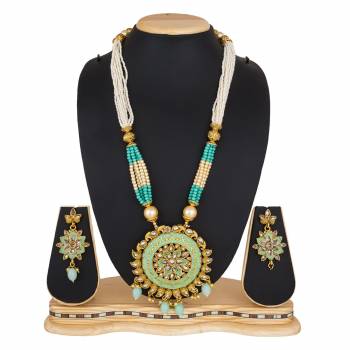 For A Queen Look, Here Is A Designer Royal Looking Necklace Set In Golden Color. This Necklace Set Can Be Paired With Heavy Ethnic Attire For More Enhanced Look. Buy Now