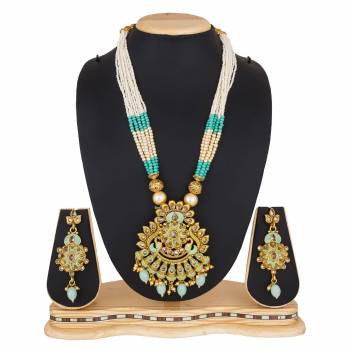 For A Queen Look, Here Is A Designer Royal Looking Necklace Set In Golden Color. This Necklace Set Can Be Paired With Heavy Ethnic Attire For More Enhanced Look. Buy Now