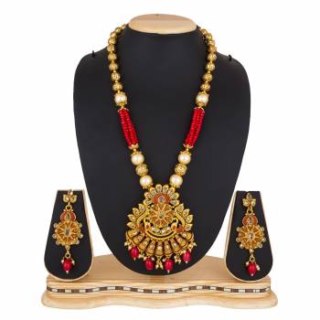 For A Queen Look, Here Is A Designer Royal Looking Necklace Set In Golden Color. This Necklace Set Can Be Paired With Heavy Ethnic Attire For More Enhanced Look. Buy Now