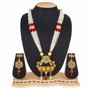 For A Queen Look, Here Is A Designer Royal Looking Necklace Set In Golden Color. This Necklace Set Can Be Paired With Heavy Ethnic Attire For More Enhanced Look. Buy Now