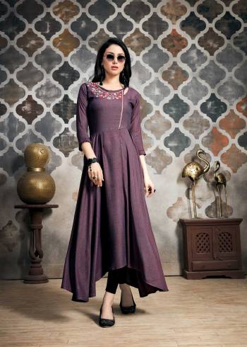 A Must Have Shade In Every Womens Wardrobe Is Here With This Designer Readymade Gown In Wine Color Fabricated On Khadi Slub. It Is Beautified With Multi Colored Thread Work. Buy Now.