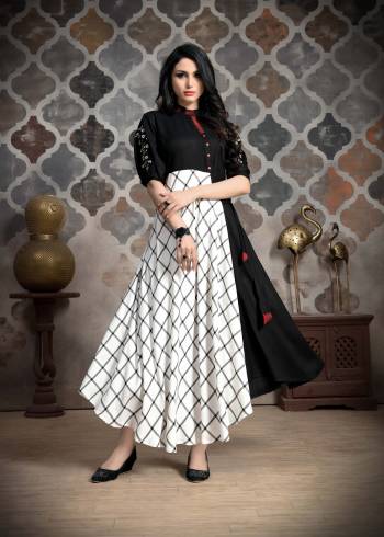 Celebrate This Festive Season With Ease And Comfort Wearing This Designer Readymade Gown In Black & White Color Fabricated On Khadi Slub. It Has Pretty Unique Pattern which Earn you Lots Of Compliments From Onlookers. 