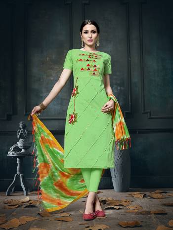 Here Is A Very Pretty Dress Material In Green Colored Top And Bottom Paired With Multi Colored Dupatta. Its Top And Bottom Are Cotton Based Paired With Soft Silk Fabricated Dupatta. 