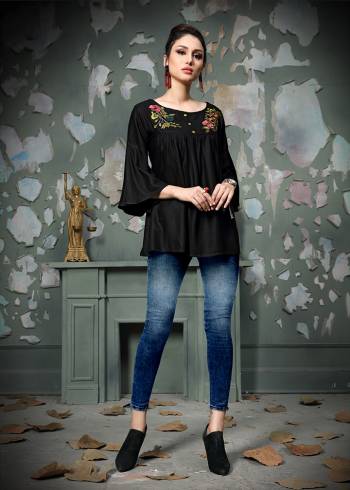 Add This Pretty Designer Readymade Top To your Wardrobe In Black Color.This Pretty Cotton Based Top Is Beautified With Multi Colored Thread Work And Avialable In All Regular Sizes. 