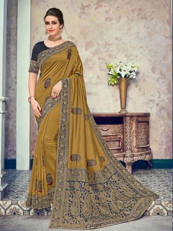 Bring out the best in you when wearing this Musturd green color two tone silk fabrics saree. Ideal for party, festive & social gatherings. this gorgeous saree featuring a beautiful mix of designs. Its attractive color and heavy designer embroidered and silk saree, beautiful floral design all over work over the attire & contrast hemline adds to the look. Comes along with a contrast unstitched blouse.