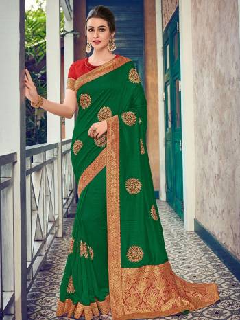 Vibrant and visually appealing, this green color two tone silk fabrics saree. Ideal for party, festive & social gatherings. this gorgeous saree featuring a beautiful mix of designs. Its attractive color and heavy designer embroidered and silk saree, beautiful floral design all over work over the attire & contrast hemline adds to the look. Comes along with a contrast unstitched blouse.