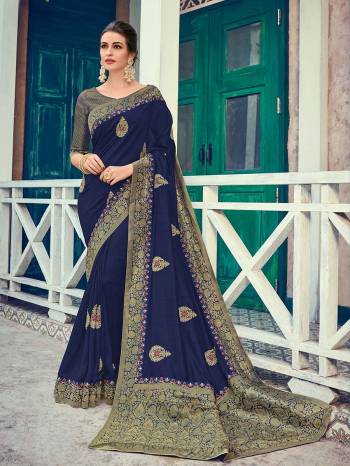 Wear this Navy Blue color two tone silk fabrics saree. Ideal for party, festive & social gatherings. this gorgeous saree featuring a beautiful mix of designs. Its attractive color and heavy designer embroidered and silk saree, beautiful floral design all over work over the attire & contrast hemline adds to the look. Comes along with a contrast unstitched blouse.