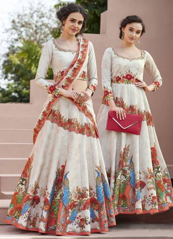 Grab This Designer Lehenga Choli For The Upcoming Festive And Wedding Season. This Lehenga Choli Is Fabricated On Satin Silk Paired With Chiffon Silk Dupatta. It Is Beautified Bold Floral Digital Prints And Thread Embroidery with Stone Work. Its Fabrucs Ensures Superb Comfort All Day Long. Buy Now.