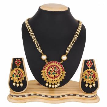 For A Queen Look, Here Is A Designer Royal Looking Necklace Set In Golden Color. This Necklace Set Can Be Paired With Heavy Ethnic Attire For More Enhanced Look. Buy Now