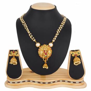 For A Queen Look, Here Is A Designer Royal Looking Necklace Set In Golden Color. This Necklace Set Can Be Paired With Heavy Ethnic Attire For More Enhanced Look. Buy Now