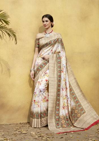 Adorn A Rich And Elegant Look Wearing This Pretty Silk Based Saree. This Saree And Blouse Are Fabricated On Tussar Art Silk Beautified With Prints All Over. This Saree Is Light In Weight And Easy To Carry All Day Long. 