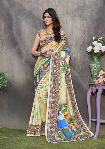 Grab This Beautiful Designer Silk Based Saree For The Upcoming Festive Season. This Saree And Blouse Are Fabricated On Tussar Art Silk Beautified With Prints All Over It. Buy Now.