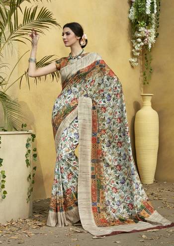 Grab This Beautiful Designer Silk Based Saree For The Upcoming Festive Season. This Saree And Blouse Are Fabricated On Tussar Art Silk Beautified With Prints All Over It. Buy Now.