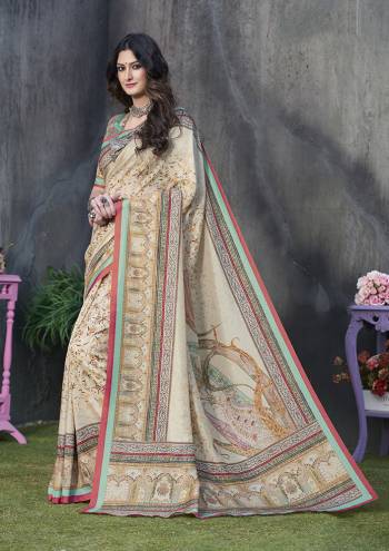 Adorn A Rich And Elegant Look Wearing This Pretty Silk Based Saree. This Saree And Blouse Are Fabricated On Tussar Art Silk Beautified With Prints All Over. This Saree Is Light In Weight And Easy To Carry All Day Long. 