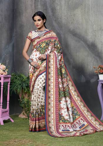 Grab This Beautiful Designer Silk Based Saree For The Upcoming Festive Season. This Saree And Blouse Are Fabricated On Tussar Art Silk Beautified With Prints All Over It. Buy Now.