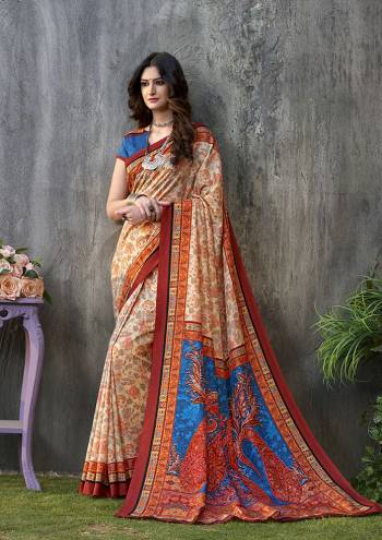 Adorn A Rich And Elegant Look Wearing This Pretty Silk Based Saree. This Saree And Blouse Are Fabricated On Tussar Art Silk Beautified With Prints All Over. This Saree Is Light In Weight And Easy To Carry All Day Long. 