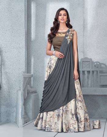 This floral printed lehenga is neutral and feminine yet speaks the language of the fashion like no other. The ready-to-wear sash dupatta is what makes this design intriguing. 