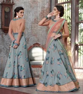 Grab This Designer Two-In-One Lehenga Choli For The Upcoming Festive And Wedding Season. Its Blouse Is Fabricated On Art Silk And Net Paired With Printed Modal Silk And Net Fabricated Dupatta. It Is Beautified With Bold Floral Prints And Attractive Embroidery. Buy Now.