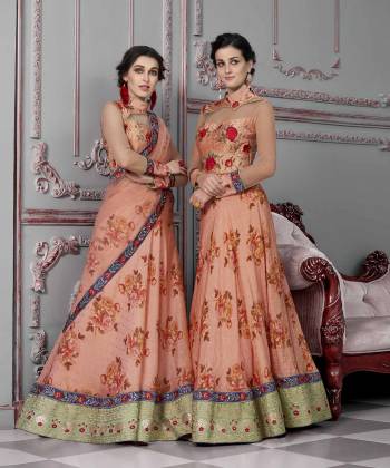 Grab This Designer Two-In-One Lehenga Choli For The Upcoming Festive And Wedding Season. Its Blouse Is Fabricated On Art Silk And Net Paired With Printed Modal Silk And Net Fabricated Dupatta. It Is Beautified With Bold Floral Prints And Attractive Embroidery. Buy Now.