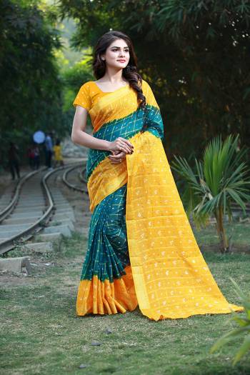 This Festive Season Be The Most Unique Of All Wearing This Handicraft Bandhani Saree. This pretty Saree And Blouse Are Fabricated On Tafeta Art Silk Which Also Gives A Rich Look To Your Personality. 