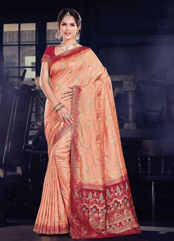 Get ready For The Upcoming Festive Season With This Designer Silk Based Saree Paired With Art Silk Fabricated Blouse. This Saree And Blouse Are Beautified With Heavy Weave All Over. Buy Now.