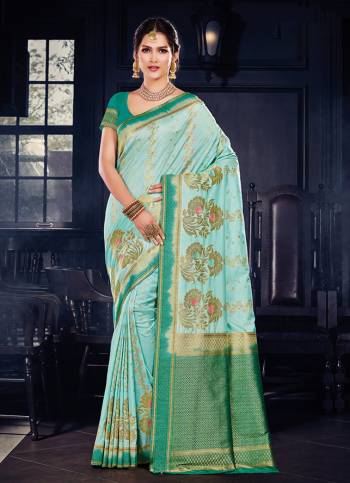 For A Rich And Elegant Look In Traditionals. Grab This Designer Silk Based Saree Paired With art Silk Fabricated Blouse. It Is Beautified With Heavy Weave all Over, And Its  Fabric And Color Pallete Gives A Rich Look To Your Personality. 