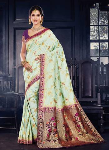 For A Rich And Elegant Look In Traditionals. Grab This Designer Silk Based Saree Paired With art Silk Fabricated Blouse. It Is Beautified With Heavy Weave all Over, And Its  Fabric And Color Pallete Gives A Rich Look To Your Personality. 