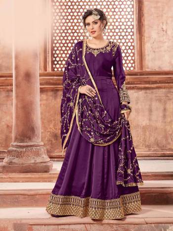 You Will Definitely Earn Lots Of Compliments Weairng This Designer Floor Length Suit In Purple Color Paired With Purple Colored Bottom And Dupatta. Its Top Is Fabricated On Satin Georgette Paired With Santoon Bottom And Heavy Embroidered Chinon Dupatta. The Main Highlight In This Designer Suit Is Its Embroidered Dupatta. Buy This Semi-Stitched Suit Now.