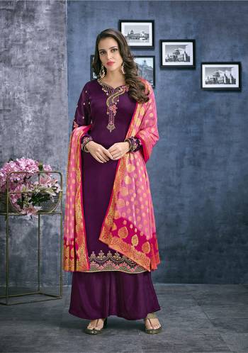 Add This Lovely Designer Straight Cut Suit To Your Wardrobe In Wine Color Paired With Contrastin Pink Colored Dupatta. Its Pretty Embroidered Top Is Fabricated On Satin Georgette Paired With Santoon Bottom And Jacquard Silk Fabricated Dupatta. Buy Now.