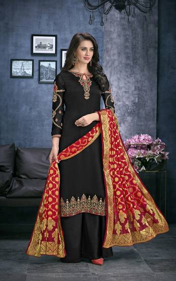 For A Bold And Beautiful Look, Grab This Designer Straight Cut Suit In Black Color Paired With Red Colored Dupatta. Its Top Is Fabricated On Satin Georgette Paired With Santoon Bottom And Jacquard Silk Fabricated Dupatta. This Suit Is Light Weight And Easy To Carry All Day Long. 