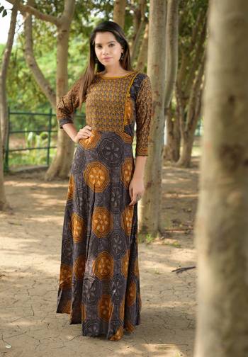 Get This Very Pretty Readymade Designer Kurti For Your Semi-Casuals. This Pretty Kurti Is Fabricated On Rayon Beautified With Prints All Over. It Is Available In All Regular Sizes. Buy Now.