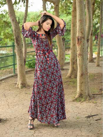 Add Some Lovely Kurtis To Your Wardrobe For This Summer With This Readymade Designer Kurti Fabricated On Rayon Beautified With Prints. It Is Light In Weight And Its Fabrics Ensures Superb Comfort All Day Long. 