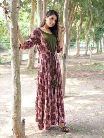 Get This Very Pretty Readymade Designer Kurti For Your Semi-Casuals. This Pretty Kurti Is Fabricated On Rayon Beautified With Prints All Over. It Is Available In All Regular Sizes. Buy Now.