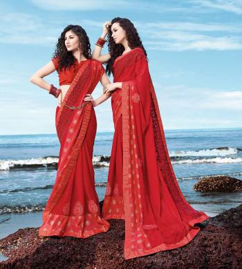 Adorn The Pretty Angelic Look Wearing This Designer Red Colored Saree Paired With Red Colored Blouse. This Saree Is Fabricated On Georgette Satin Paired With Art Silk Fabricated Blouse. It Is Beautified With Attractive Tone To Tone Embroidery. 