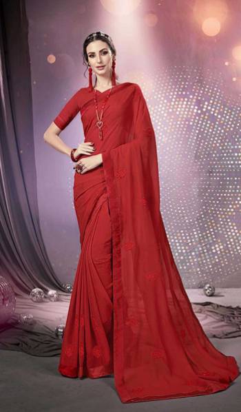 Here Is A Very Pretty Designer Saree Fabricated On Chiffon Paired With Art Silk Fabricated Blouse. It Is Beautified With Tone To Tone Thread Embroidery And Stone Work Which Gives A Rich Look Overall. Buy This Saree Now.