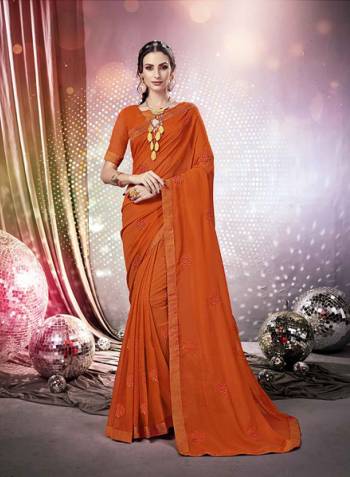 Here Is A Very Pretty Designer Saree Fabricated On Chiffon Paired With Art Silk Fabricated Blouse. It Is Beautified With Tone To Tone Thread Embroidery And Stone Work Which Gives A Rich Look Overall. Buy This Saree Now.