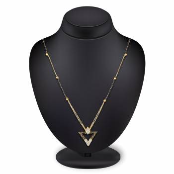 Give An Elegant Look To Your Neckline With This Rich Designer Mangalsutra Set Beautified With Diamond Work. Pair This Up With Any Colored Attire, Be It Casual Or Heavy. Buy This Pretty Set Now.