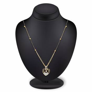 Grab This Pretty Simple Mangalsutra For Your Daily Wear In Golden?Color Beautified With Diamonds. This Mangalsutra Can Be Paired With Any Attire. Buy Now