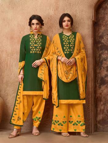 Simple And elegant Looking Straight Suit Is Here In Dark Green Colored Top Paired With Musturd Yellow Colored Bottom And Dupatta. This Dress Material Is Cotton Based Paired With Chiffon Fabricated Dupatta. Get This Stitched As A Plazzo Or Salwar As Per Your Desired Comfort. 