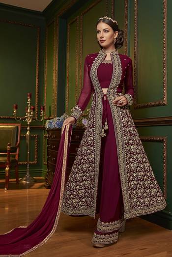 New Patterned Designer Indo-Western Dress Is Here In Maroon Color. It Has Heavy Embroidered Top And Plazzo Pants Fabricated On Georgette Paired With Chiffon Dupatta. This Pretty Designer Dress Will Definitely Earn You Lots Of Compliments From Onlookers.