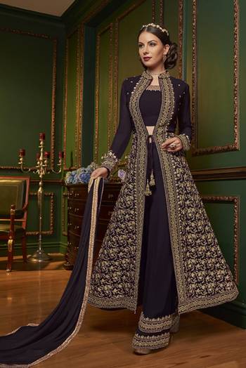 New Patterned Designer Indo-Western Dress Is Here In Dark Wine Color. It Has Heavy Embroidered Top And Plazzo Pants Fabricated On Georgette Paired With Chiffon Dupatta. This Pretty Designer Dress Will Definitely Earn You Lots Of Compliments From Onlookers.