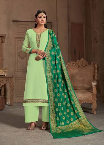 Summer Is All About Colors, Grab This Beautiful Designer Straight Suit In Pastel Green Color Paired With Green Colored Dupatta, Its Embroidered Top Is Fabricated On Satin Georgette Paired With Santoon Bottom And Banarasi Silk Dupatta.Buy This Suit Now.