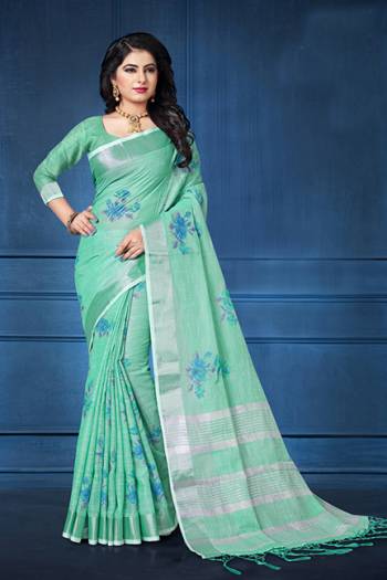 Add This Pretty Saree For your Semi-Casual Wear With Floral Prints All Over. This Saree And Blouse Are Fabricated On Linen Which Ensures Superb Comfort All Day Long