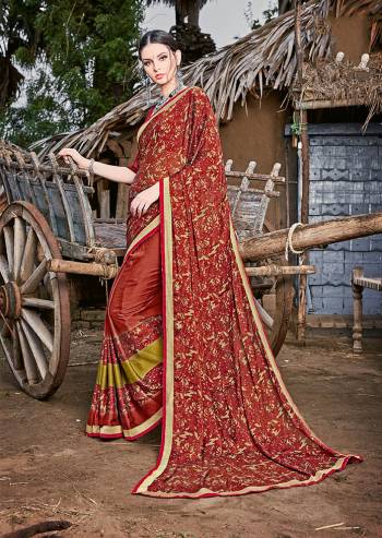 Grab This Beautiful Printed Saree For Semi-Casuals. This Saree And Blouse Are Fabricated On Magic Chiffon Beautified With Prints And Lace Border. It Is Light Weight And Easy To Carry All Day Long. 