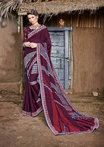 Grab This Beautiful Printed Saree For Semi-Casuals. This Saree And Blouse Are Fabricated On Magic Chiffon Beautified With Prints And Lace Border. It Is Light Weight And Easy To Carry All Day Long. 