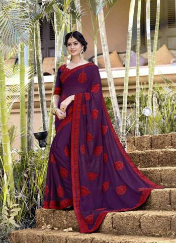 Rich And Elegant Looking Designer Saree Is Here In Purple Color Paired With Purple Colored Blouse. This Saree Is Georgette fabricated Beautified With Thread Embroidery And stone Work .It Is Light Weight And Easy To carry All Day Long.